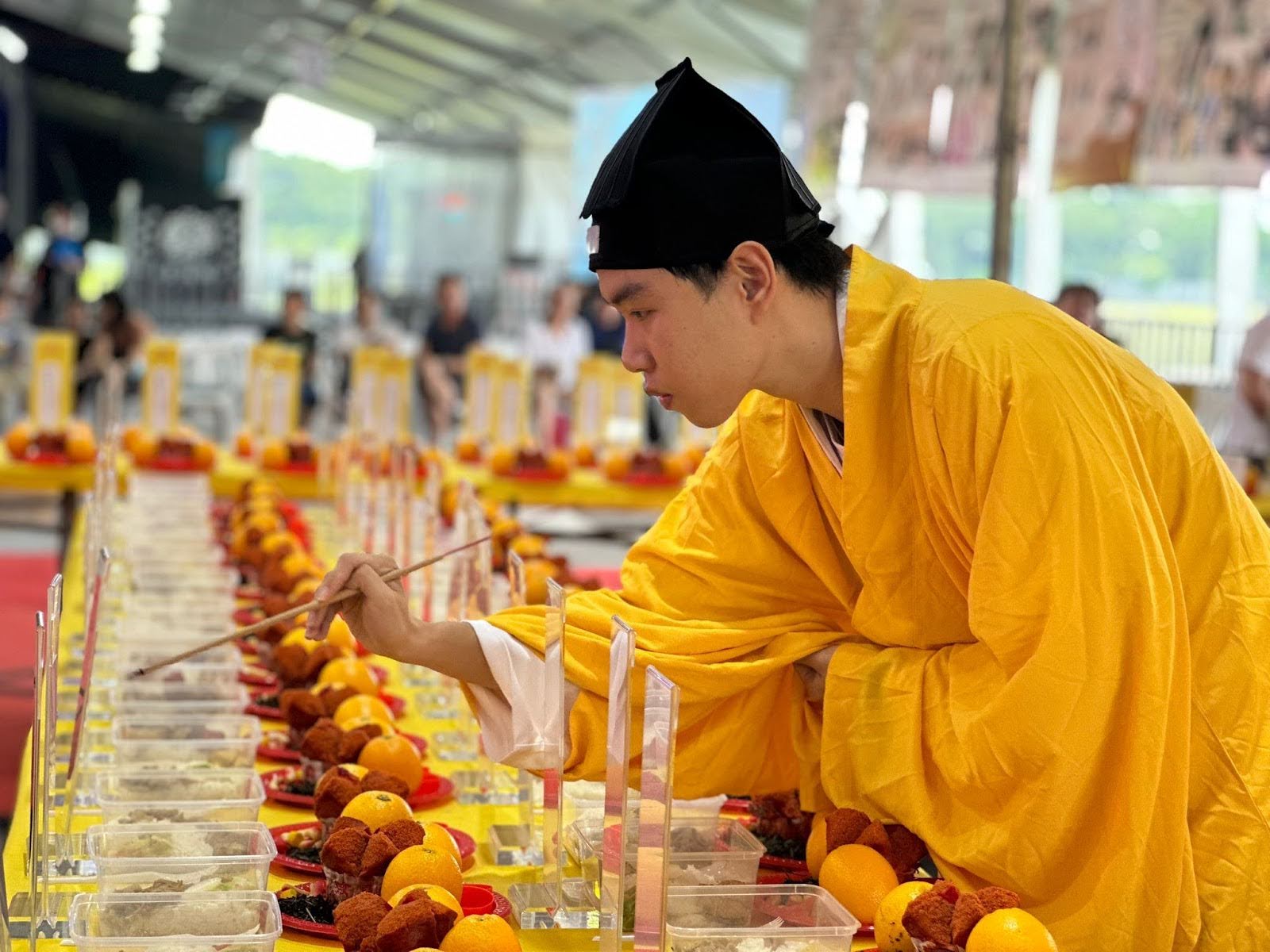 Taoist priest Chee Tong preparing for a ritual.